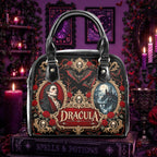 Dracula Vegan Leather Handbag : A black gothic handbag with 'Dracula' themed artwork, featuring portraits of Dracula and a castle under a full moon, set against a dark red rose and bat pattern. The bag is styled on a book labeled 'Spells & Potions' in a dark, purple-themed room with candles and gothic decor.