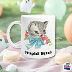 Retro Kitsch Mug with a cat illustration and funny text on a decorative background with macarons and balloons.
