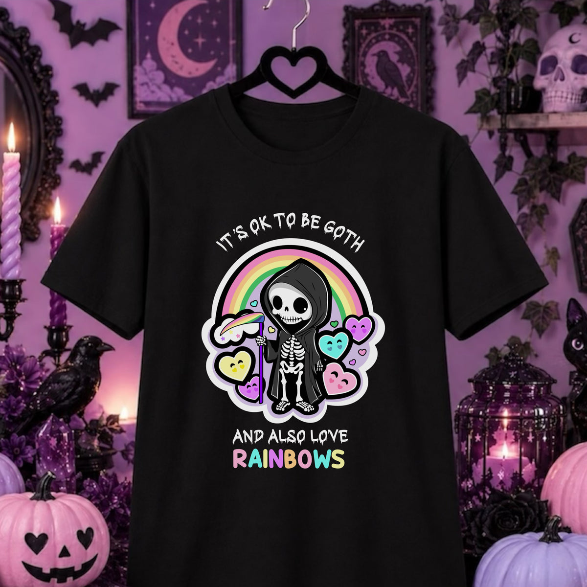 A black short-sleeve graphic t-shirt hanging on a black hanger against a purple Halloween-themed background with pumpkins, candles, and a skeleton illustration on the front.