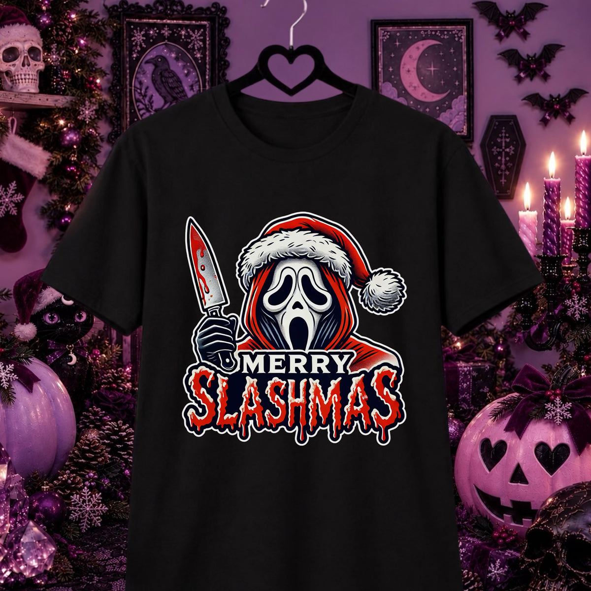 A black short-sleeve graphic T-shirt hanging on a black hanger against a Halloween-themed purple background. The shirt features a Ghostface-style grim reaper face wearing a Santa hat and holding a knife, with the text 'MERRY SLASHMAS' below in red and white.